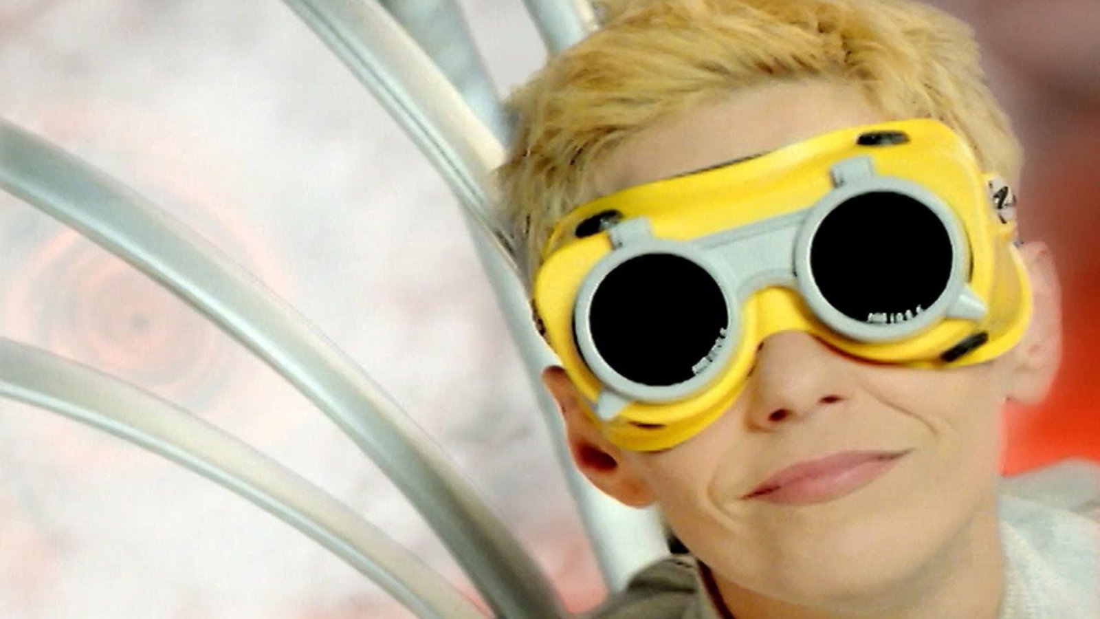 A Woman with Short Blonde Hair Wearing Yellow Glasses 